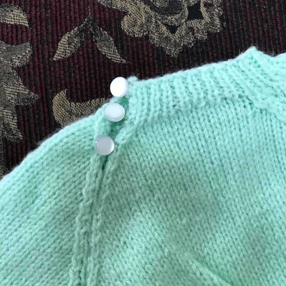 Baby sweater and mittens